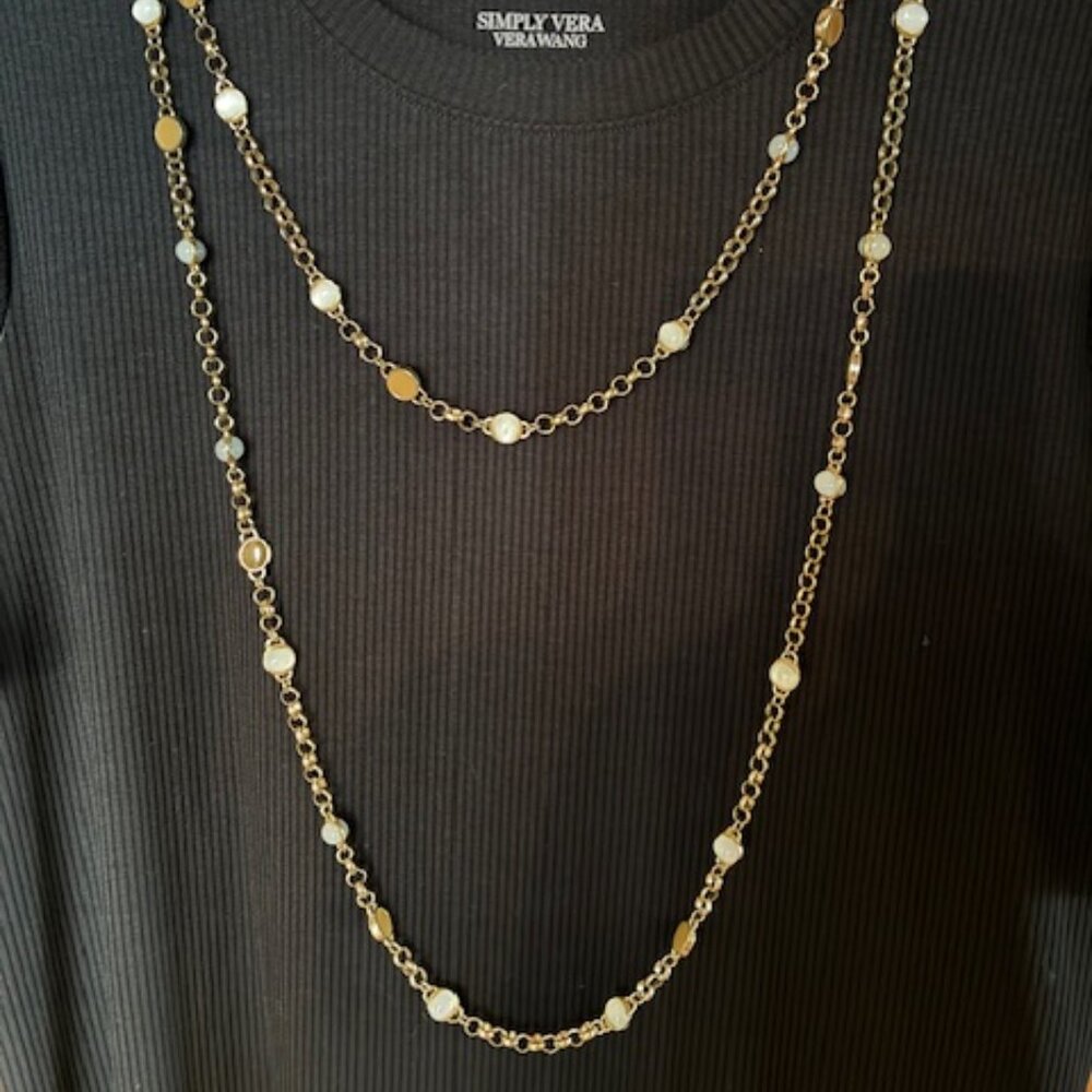 Coldwater Creek long gold tone necklace with tan and white circles